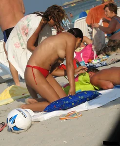 Beach voyeur babes in bikinis, thongs and topless