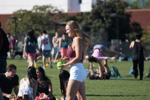 Girl in Shorts and Top in the Park Creepshot