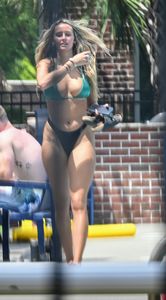 Fantastic ass at the pool in a thong