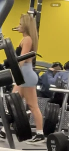 Petite blonde with bubble butt in blue spandex shorts