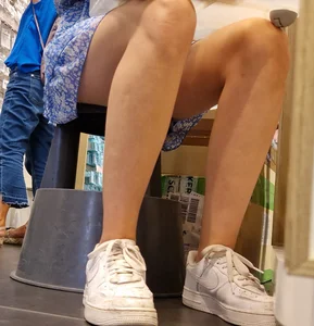 Hotter than the Sun creepshots of a candid girl in an airy dress at the store, closeup of her slim legs