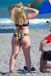 Chubby white girls in bikinis on the beach