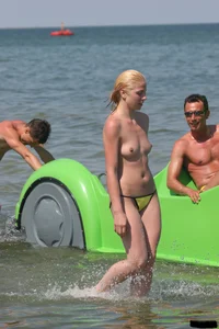 A bunch of sexy beach voyeur babes in bikinis, thongs and topless