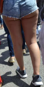Thick booty babe in denim shorts showing her cheeks