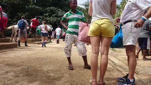 Milf in yellow shorts with vpl and a wedgie