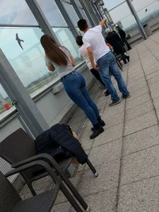 Big sexy ass in tight jeans at the airport