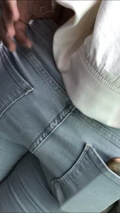 Fat ass in light jeans