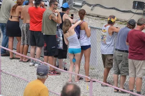 Skinny babe with a cute little ass in tiny blue shorts
