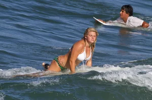 Candid surfer babes on the beach and in bikinis