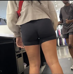 Sexy LuLu Lemon employee in tight black biker shorts