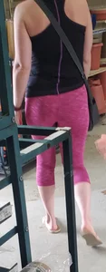 Milf shopping with a nice ass in tight maroon leggings