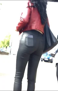 Chav brunette with a nice ass and vpl in tight black leather pants