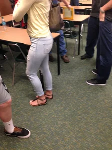 Candid College Girl in Tight Jeans And Sandals Class Photo