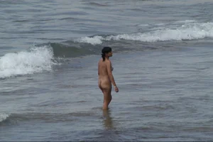 Girls on a nude beach in Sitges, Spain