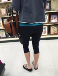 Sexy lady shopping at Walmart in leggings