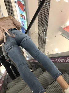 Girl with Flat Hot Ass and Long Legs in Tight Blue Jeans Mall Escalator Creepshots