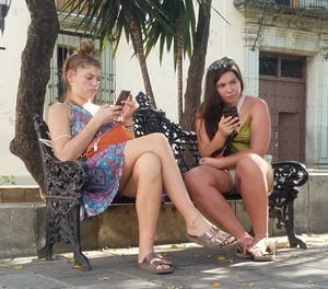 Nice legs and feet in the park (one of them showing little else)