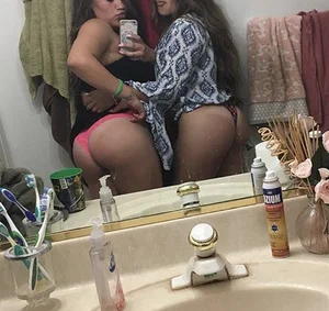 Two Girls in Panties Taking a Selfie in a Bathroom Mirror, Big Booties