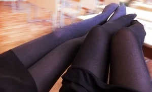 Teens Sitting in Classroom with Legs on Table - Black Pantyhose