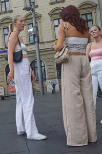 Long blonde braless in a white outfit (many pictures)