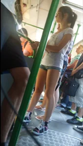 Cute Candid Girl in Mini Shorts and Sneakers Bus Creepshot