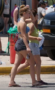 Girls in bikinis getting ready for tubing