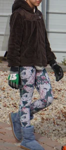 Skinny teen neighbor raking leaves in tight floral patterned leggings