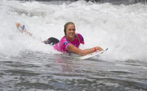 Candid surfer babes on the beach and in bikinis