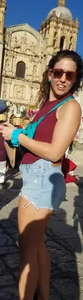 Laughing girl in shorts, legs and thick peach