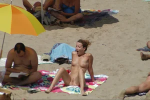 Girls on a nude beach in Sitges, Spain