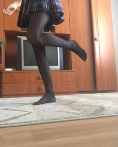 Skinny Legs in Black Pantyhose and Skirt Home Selfie