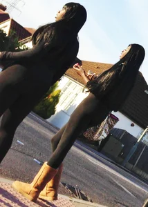 2 sexy black girls in leggings with nice asses