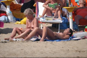 Girls on a nude beach in Bibione, Italy