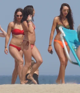 3 sexy girls on the beach in bikinis