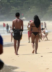 Sexy Asian on the beach with nice boobs and ass
