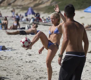Cute candid beach volleball player in a swimsuit creepshots