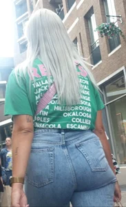 Blonde girl wearing blue jeans with a great ass street creepshots