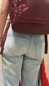 Sexy teen wearing skimpy top