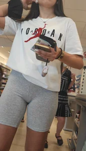 Amazing girl in grey spandex shorts at the mall, closeups of her firm hot ass and her crotch