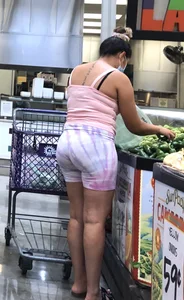 Thick Latina babe with a nice ass in tight patterned shorts