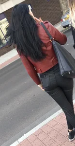 Chav brunette with a nice ass and vpl in tight black leather pants