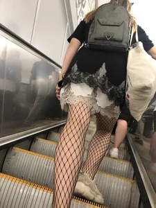 Cute Girl in Lacey Semi-Transparent Dress and Fishnet Pantyhose Subway Escalator Candid Photos Gallery