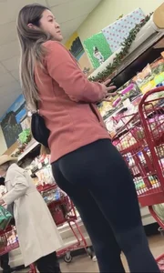 asian round booty looking for flowers at Trader joes