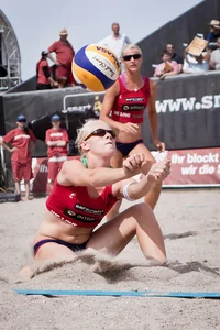 Sexy beach volleyball girls in bikinis