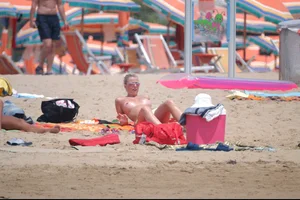 Girls on a nude beach in Bibione, Italy
