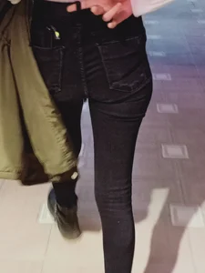 Skinny candid teen girl wearing black jeans street creepshots, closeup of her booty and slim legs