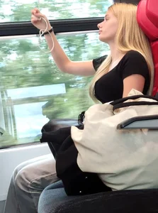 Hot busty blonde on train