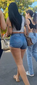 super sexy denim short shorts on this brunette with tremendous legs and big butt