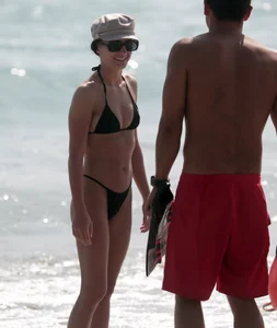 Thick and skinny friends on the beach in thongs