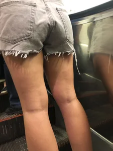 Hot Legs and Ass in Denim Fringe Shorts Escalator Closeup Creepshots